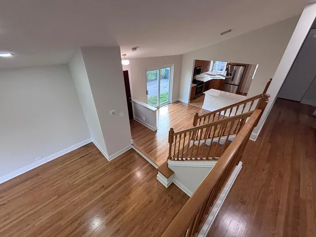 a view of entryway with wooden floor