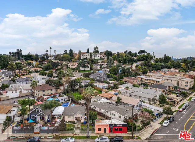 an aerial view of a city with lots of residential buildings