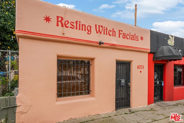 a sign that is on the wall of building