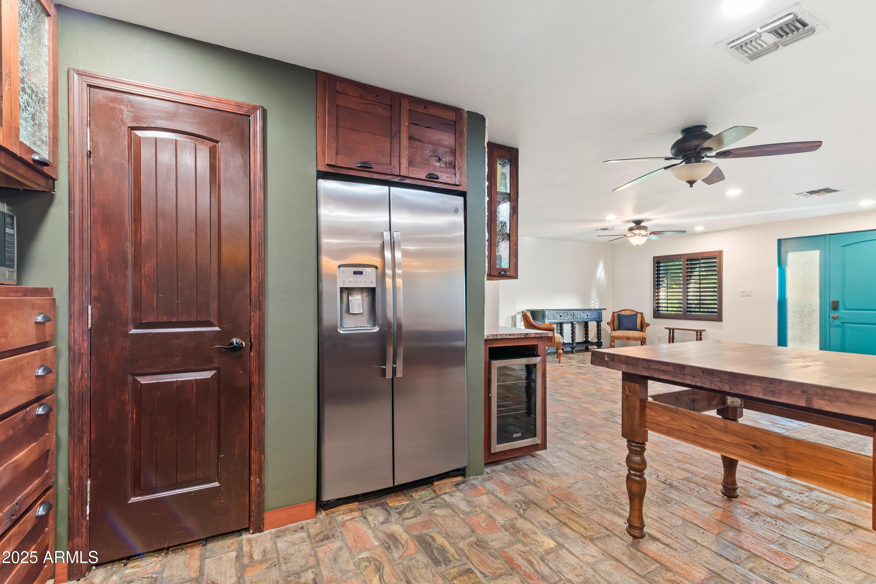 7502 North 7th Avenue Phoenix, AZ 85021 - Photo 12 of 56 a kitchen with stainless steel appliances granite countertop a refrigerator and a sink