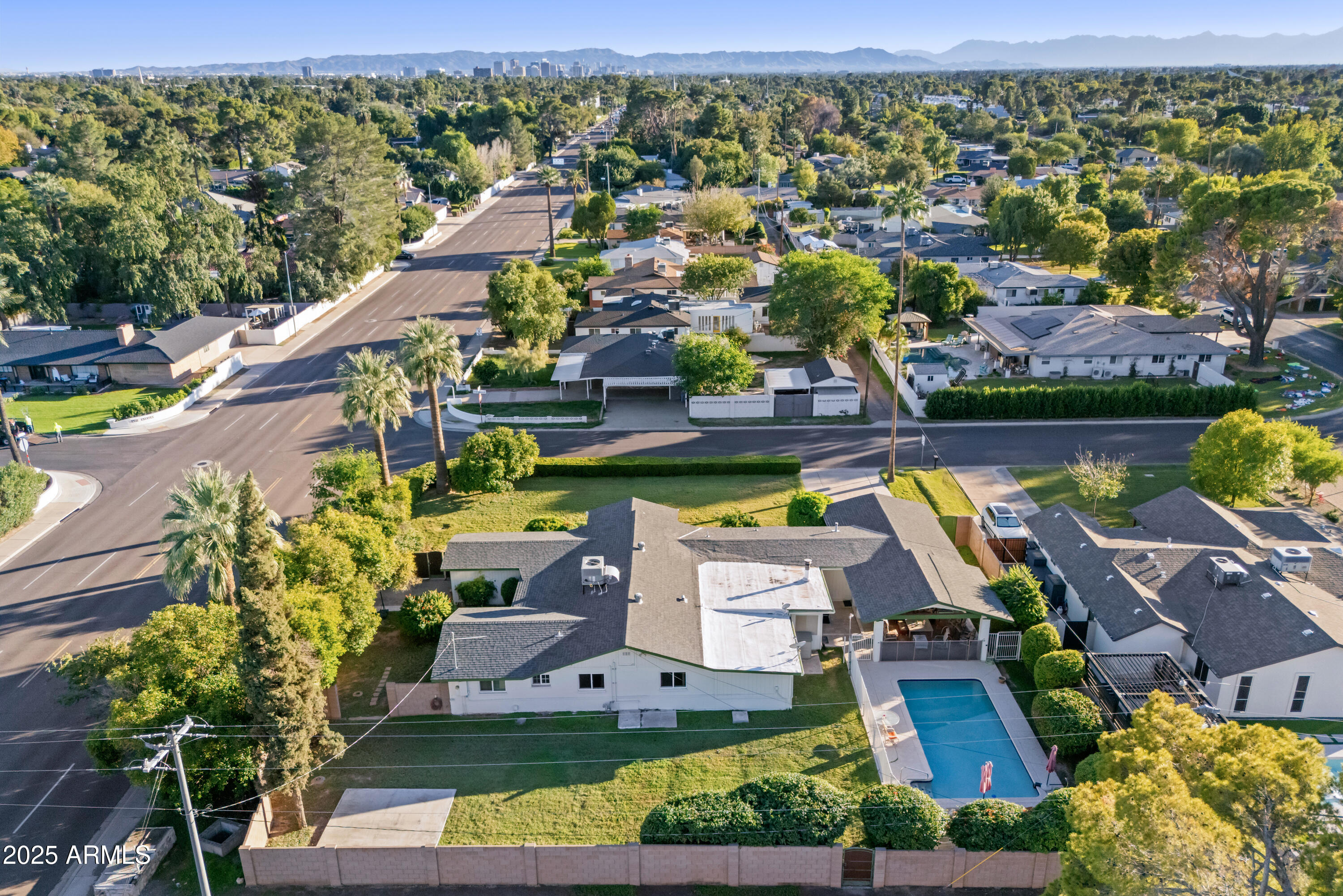 7502 North 7th Avenue Phoenix, AZ 85021 - Photo 41 of 56 an aerial view of a house with swimming pool outdoor seating and yard