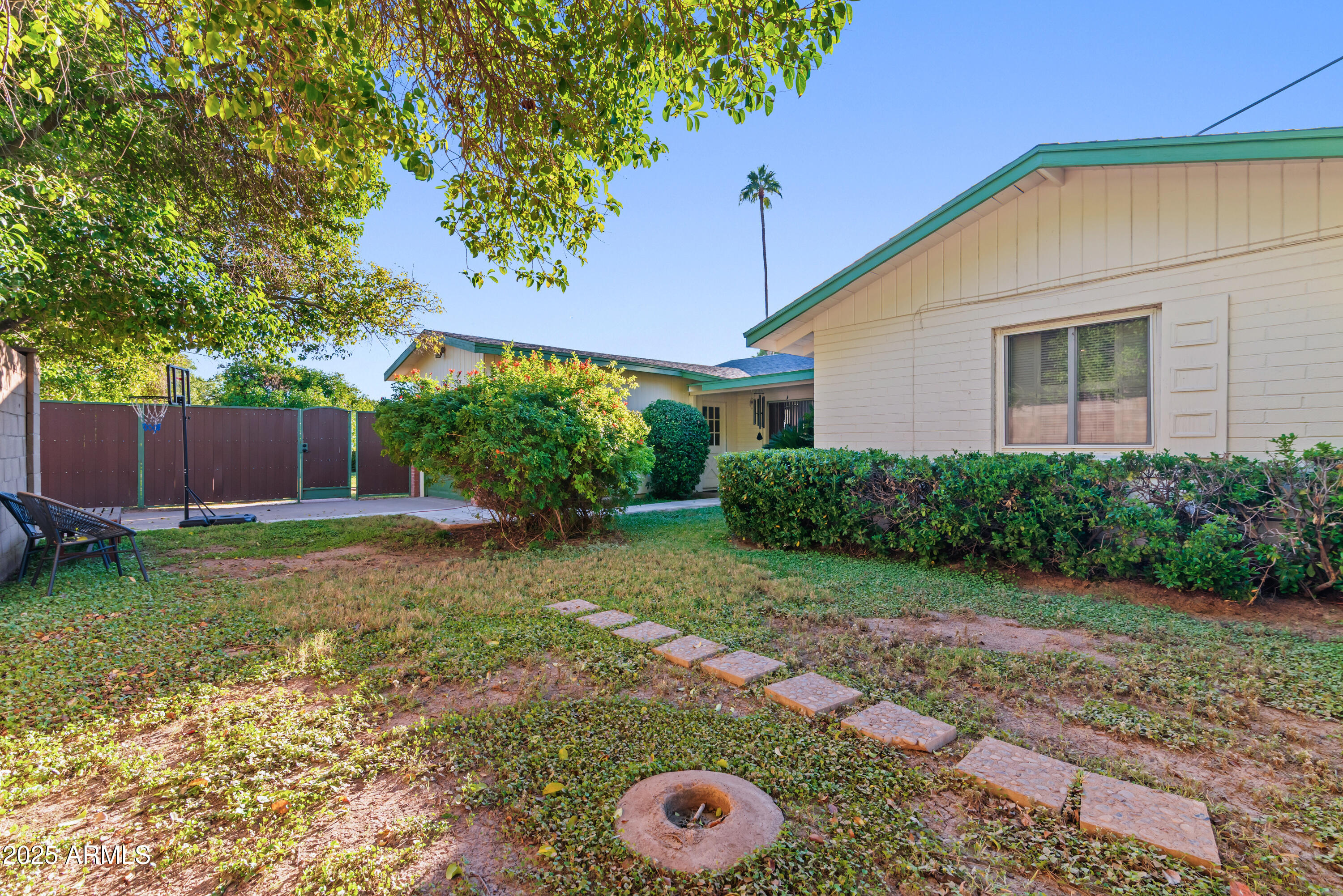 7502 North 7th Avenue Phoenix, AZ 85021 - Photo 47 of 56 a front view of a house with garden
