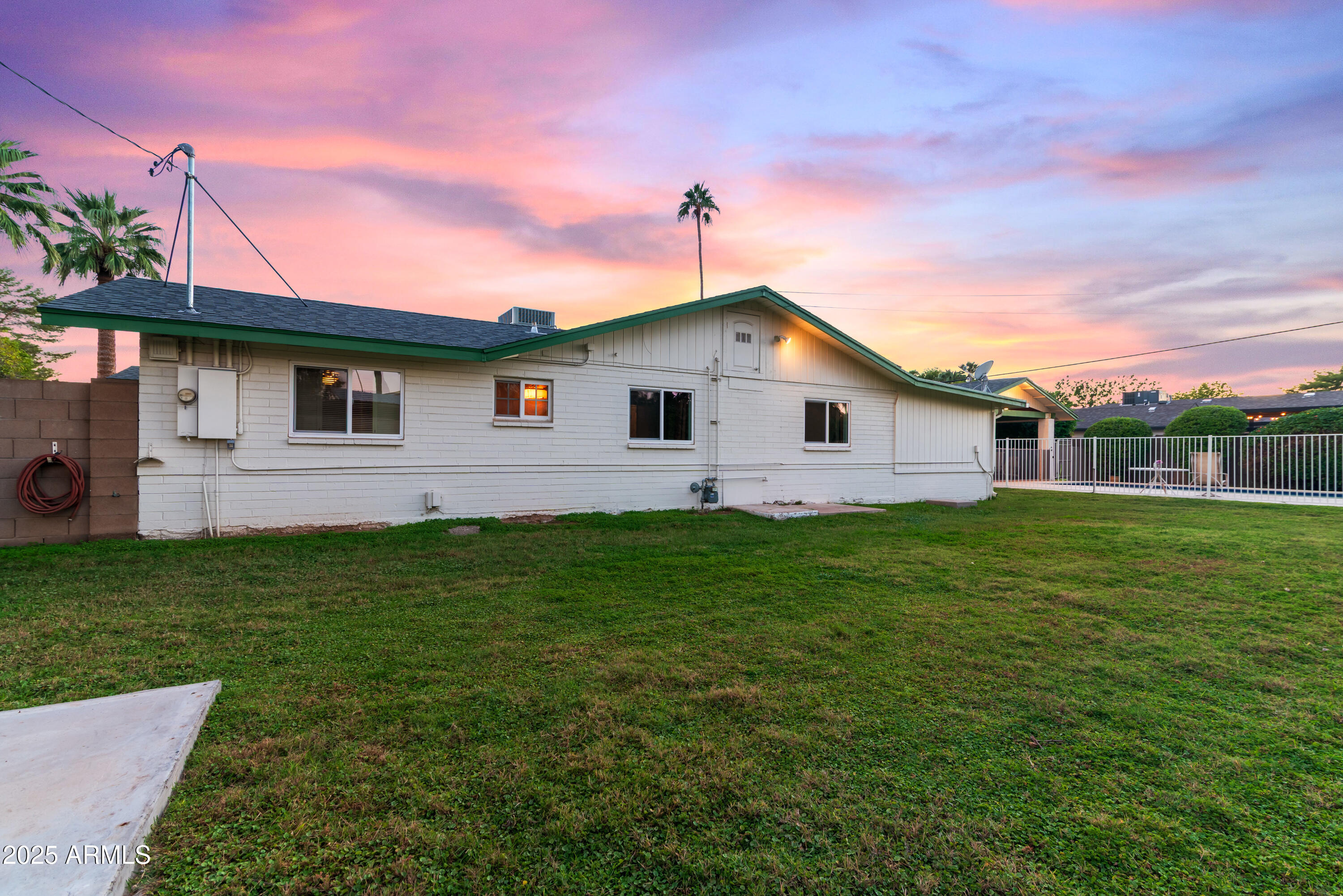 7502 North 7th Avenue Phoenix, AZ 85021 - Photo 51 of 56 a front view of a house with a yard