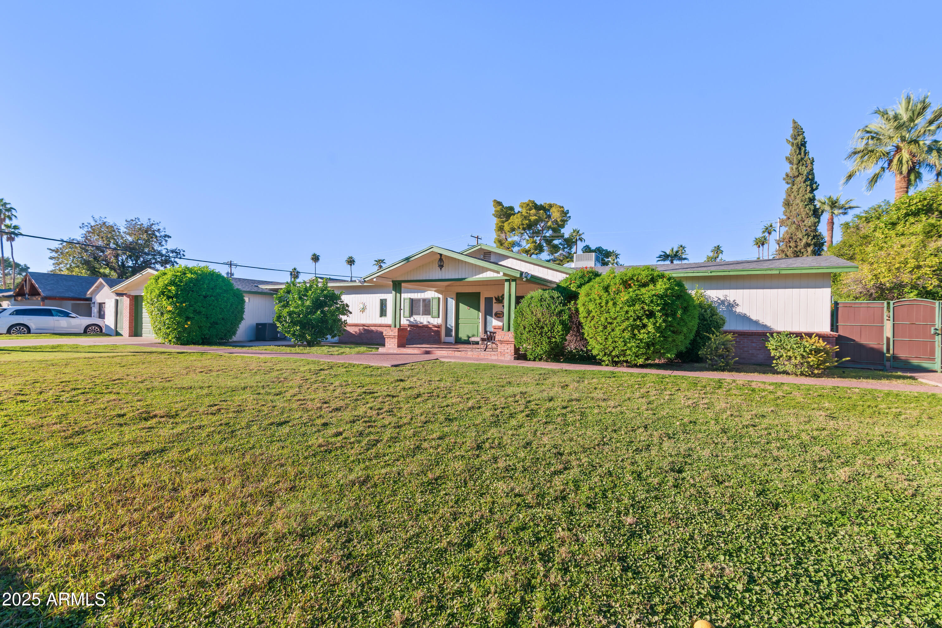 7502 North 7th Avenue Phoenix, AZ 85021 - Photo 53 of 56 a view of a house with a yard and potted plants