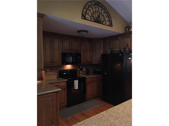 2299 Blackburn Bridge Road Maiden, NC 28650 - Photo 22 of 22 a kitchen with stainless steel appliances granite countertop a refrigerator and a stove