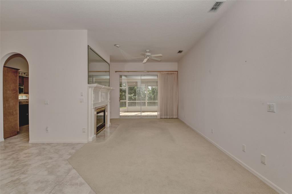 58 Byrsonima Loop Homosassa, FL 34446 - Photo 14 of 43 an empty room with windows
