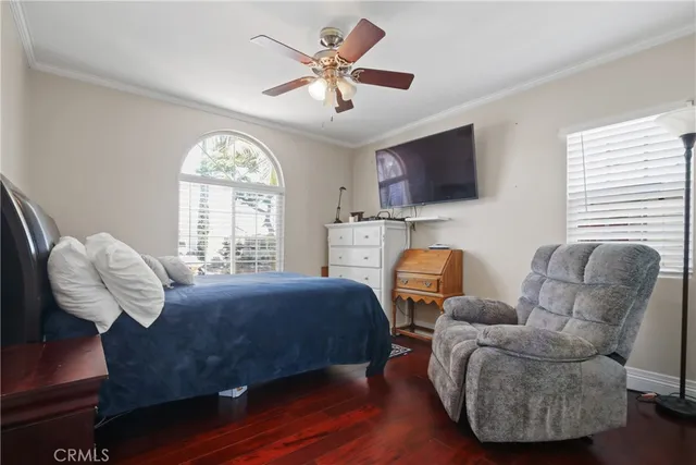 a living room with furniture fireplace and a window