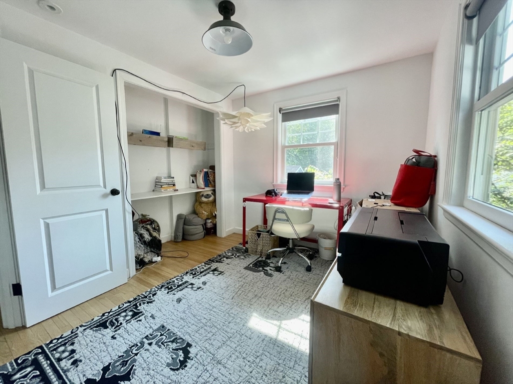 4 Carter Road Woburn, MA 01801 - Photo 13 of 28 a living room with furniture a window and a table
