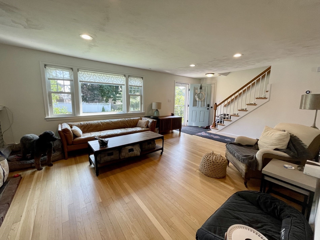 4 Carter Road Woburn, MA 01801 - Photo 6 of 28 a living room with furniture and a wooden floor