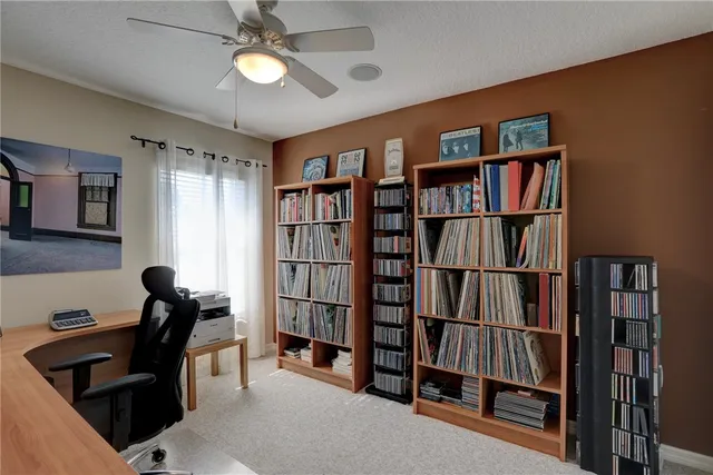 a view of a workspace with furniture