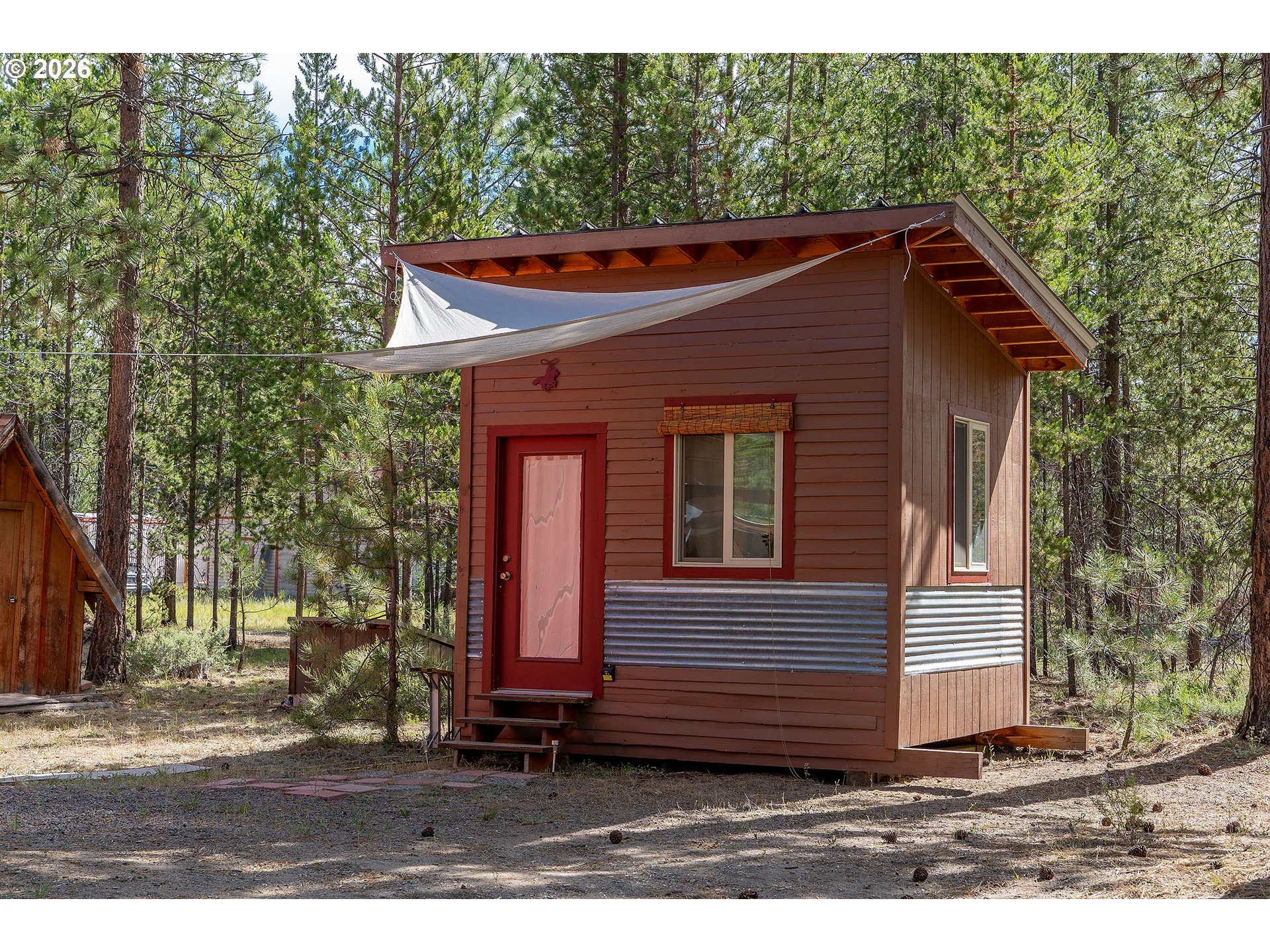 15635 6th Street La Pine, OR 97739 - Photo 18 of 30 a front view of a house with a yard