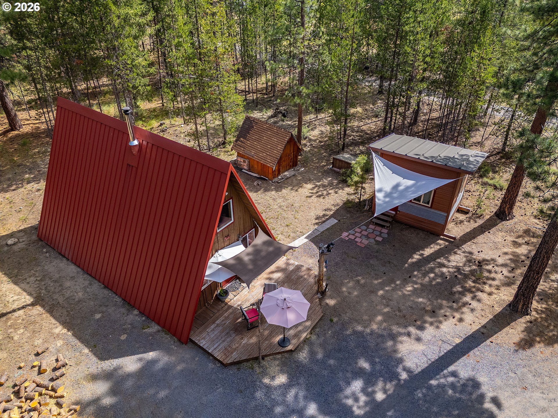 15635 6th Street La Pine, OR 97739 - Photo 27 of 30 a view of a backyard with sitting area