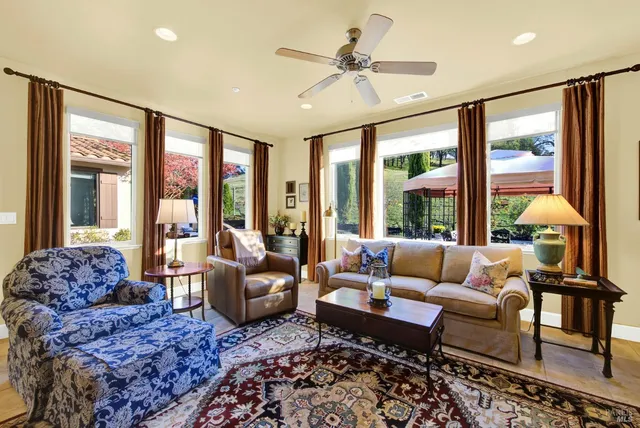 a bath tub sitting next to a window