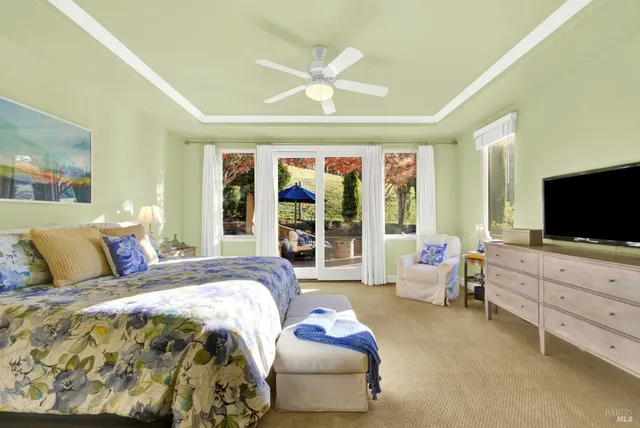 a view of a house with sitting area and furniture