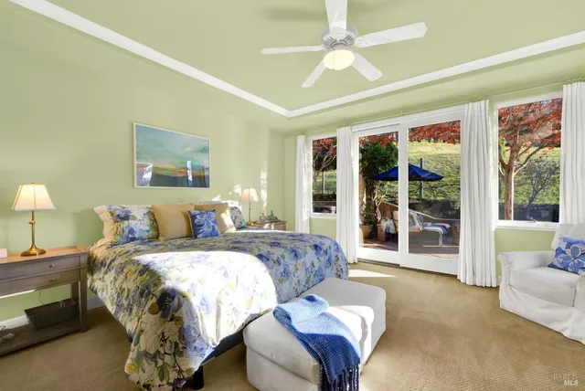 a view of a garden with an outdoor seating