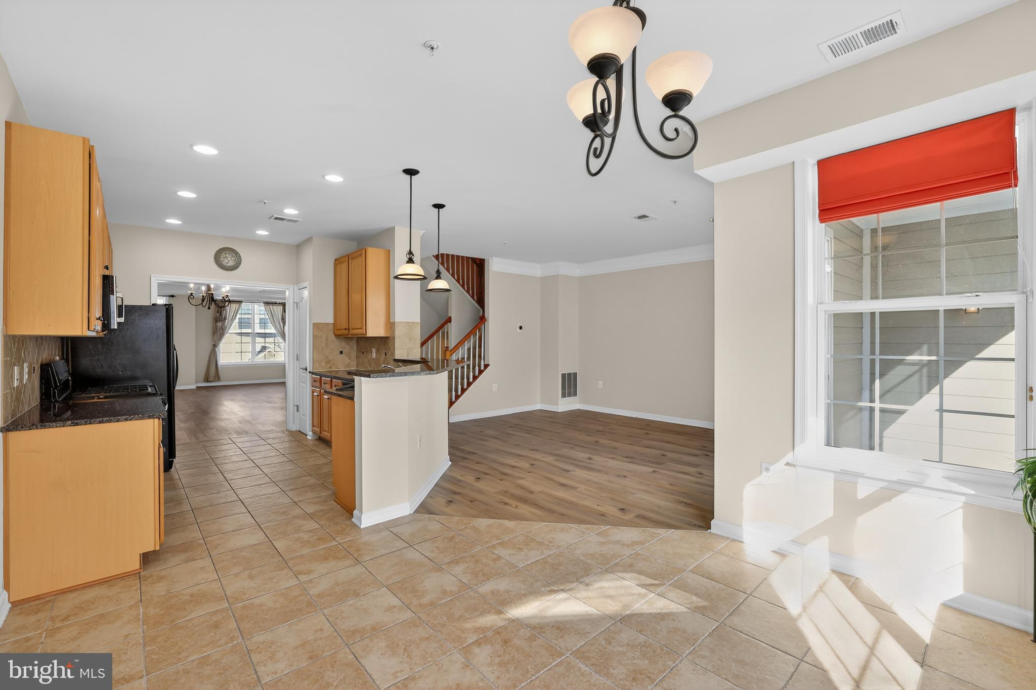 2228 Highfly Terrace, Unit 2228 Silver Spring, MD 20902 - Photo 14 of 35 a view of kitchen with furniture and counter