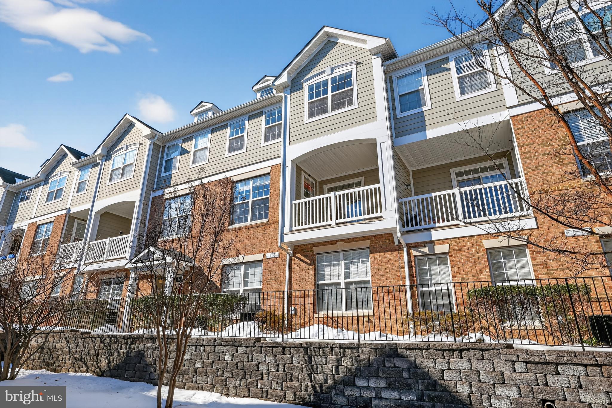 2228 Highfly Terrace, Unit 2228 Silver Spring, MD 20902 - Photo 17 of 35 a front view of a multi story building