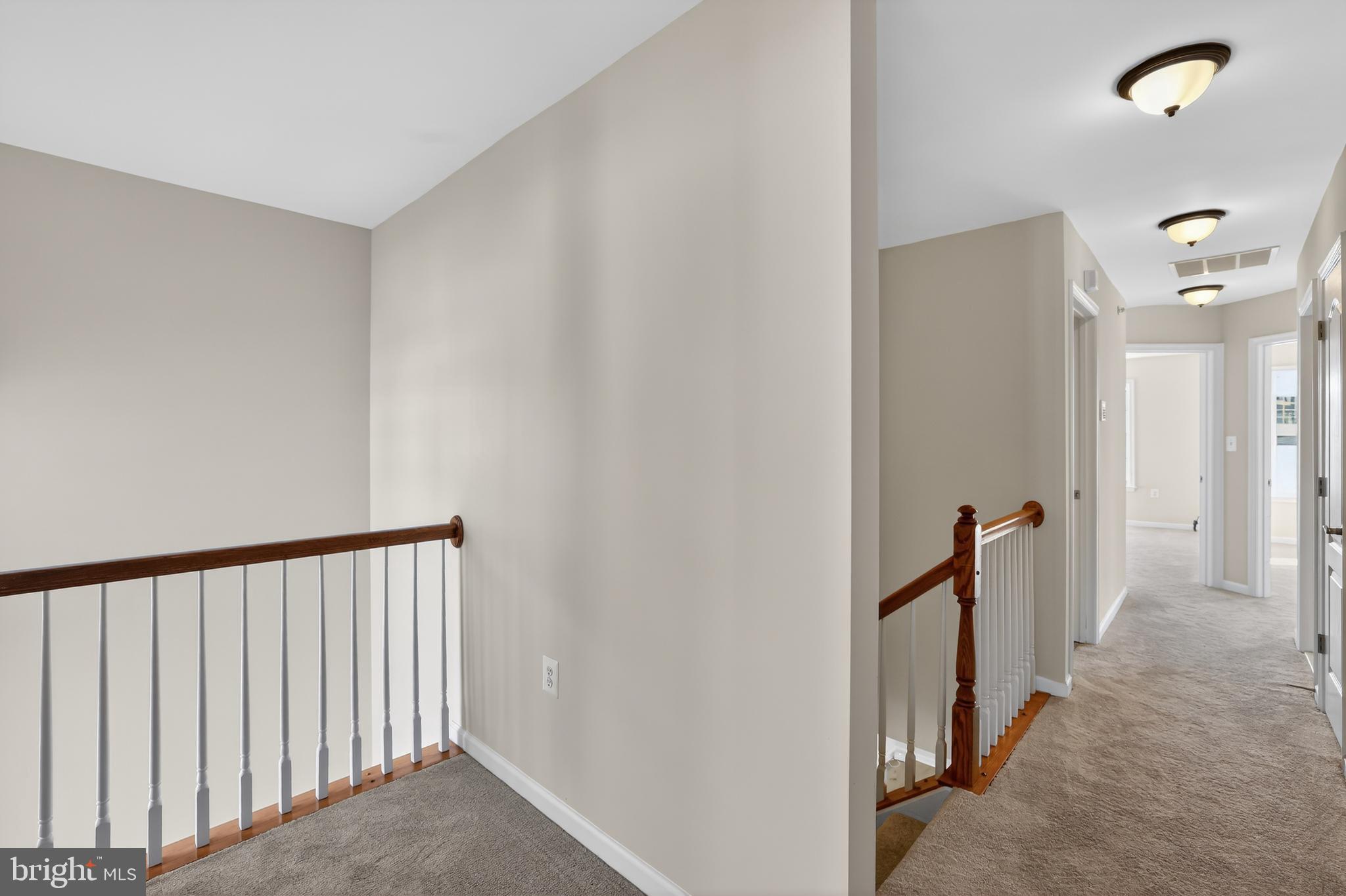 2228 Highfly Terrace, Unit 2228 Silver Spring, MD 20902 - Photo 18 of 35 a view of a hallway with a white door