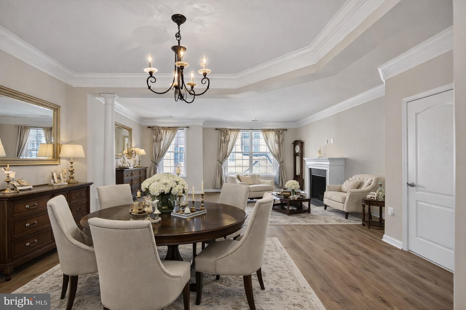 2228 Highfly Terrace, Unit 2228 Silver Spring, MD 20902 - Photo 2 of 35 a view of a dining room with furniture wooden floor and chandelier