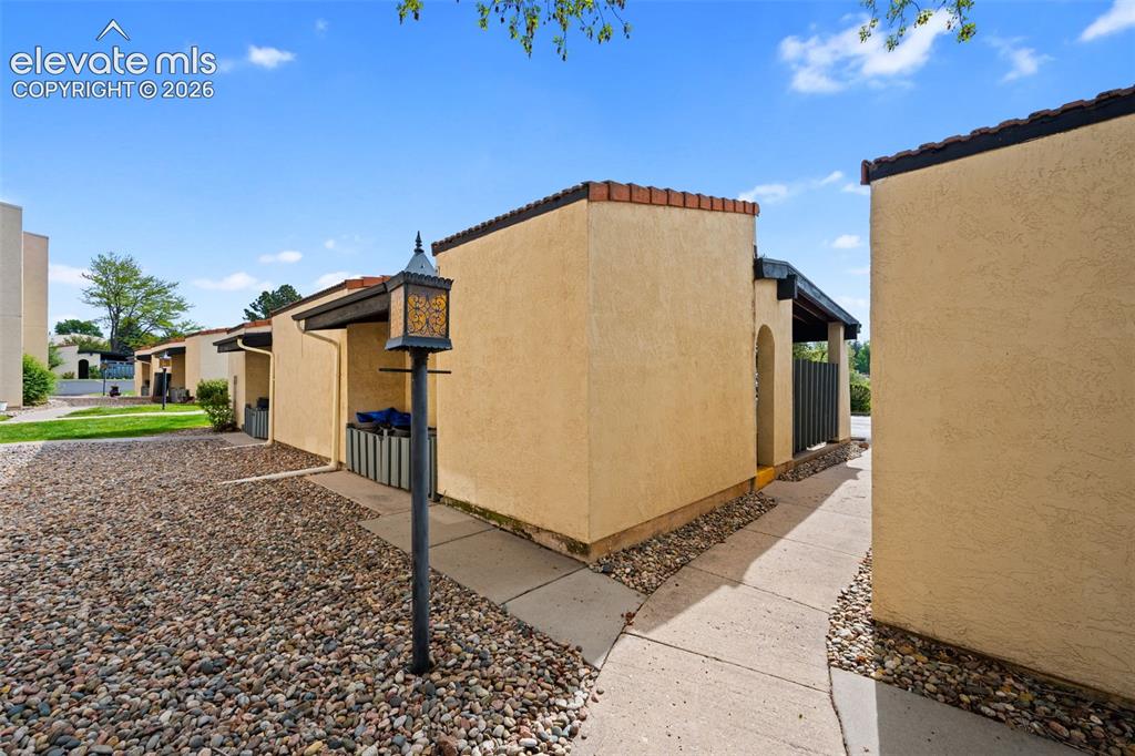 1018 Fontmore Road, Unit A Colorado Springs, CO 80904 - Photo 22 of 28 a view of a house with backyard