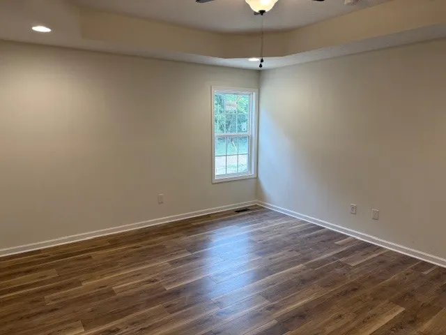 a bathroom with double vanity sink and a mirror