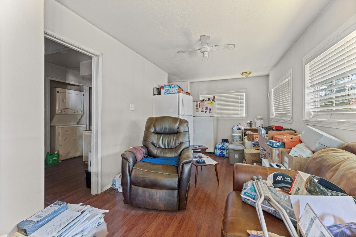 16032 1/2 Ridlon Street Channelview, TX 77530 - Photo 24 of 40 a living room with furniture and a wooden floor