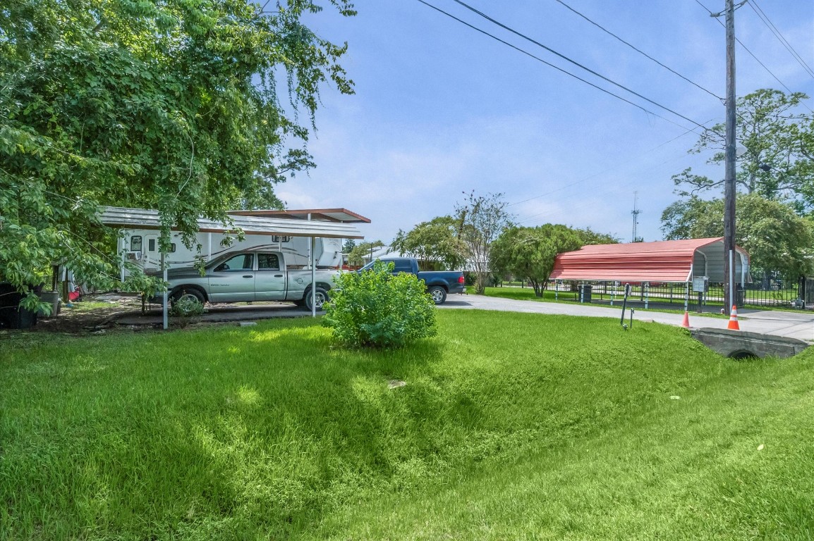16032 1/2 Ridlon Street Channelview, TX 77530 - Photo 27 of 40 a house view with a garden space