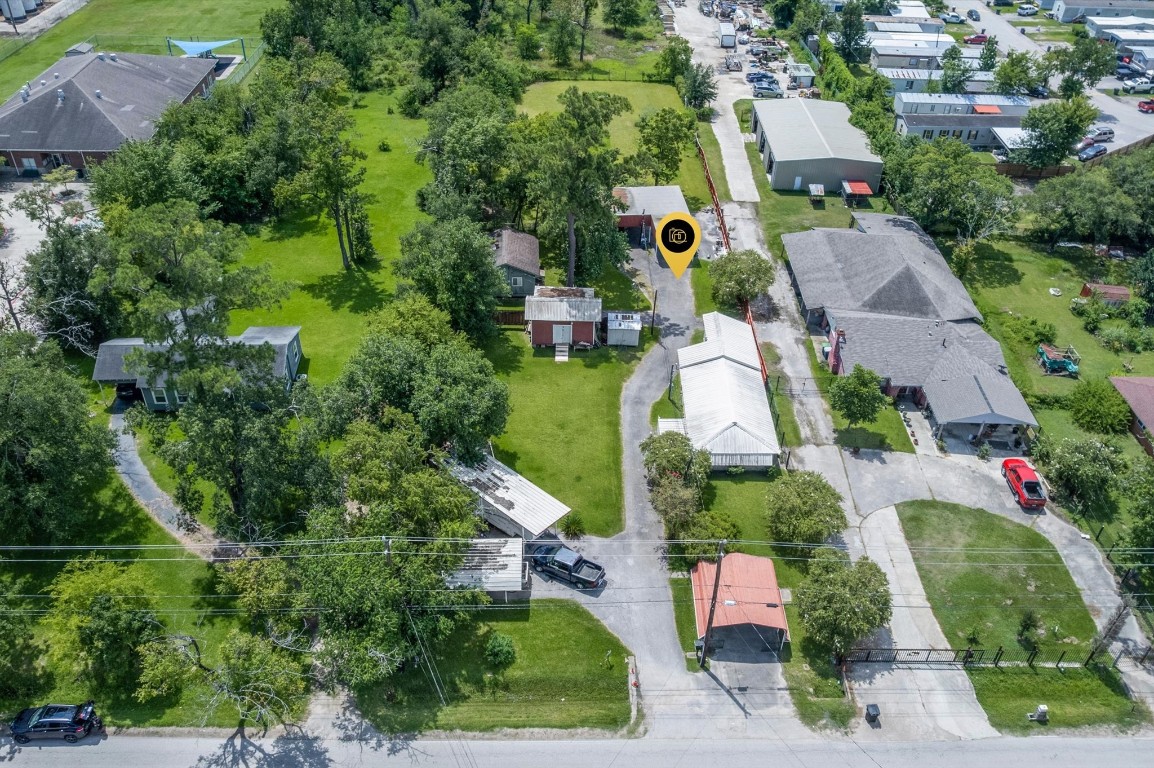 16032 1/2 Ridlon Street Channelview, TX 77530 - Photo 35 of 40 an aerial view of residential houses with outdoor space