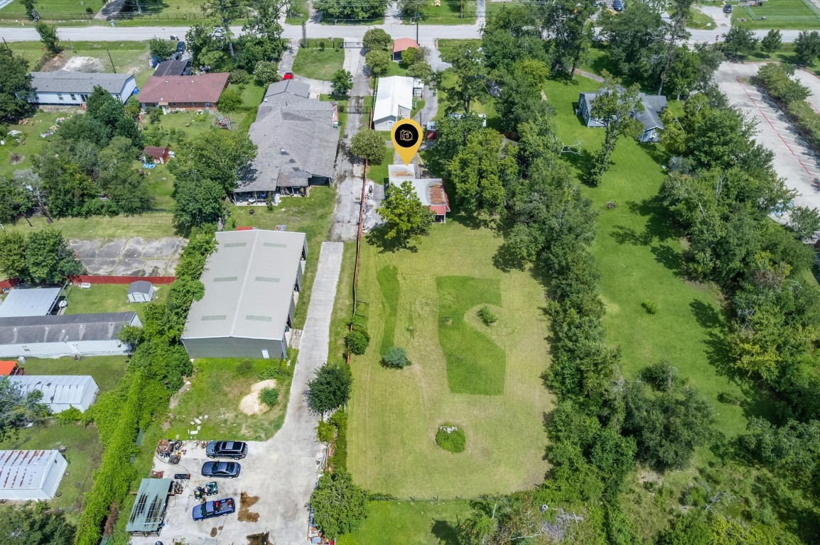 16032 1/2 Ridlon Street Channelview, TX 77530 - Photo 37 of 40 an aerial view of residential house with swimming pool