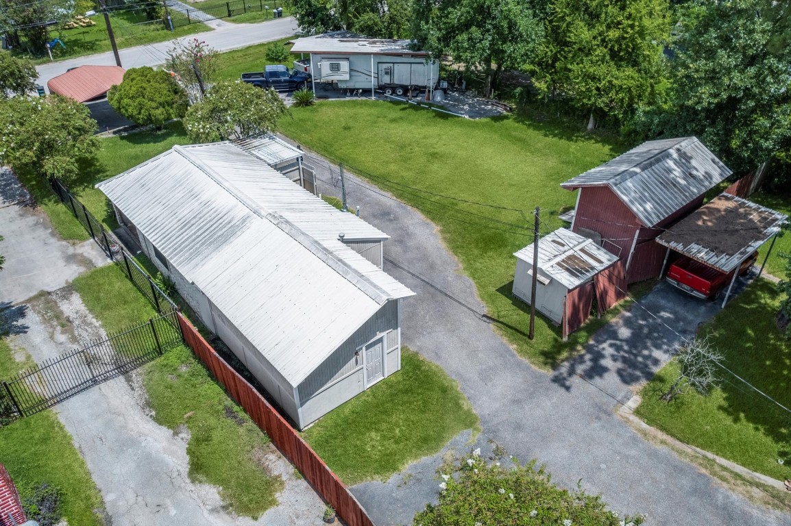 16032 1/2 Ridlon Street Channelview, TX 77530 - Photo 8 of 40 an aerial view of a house with garden space and street view