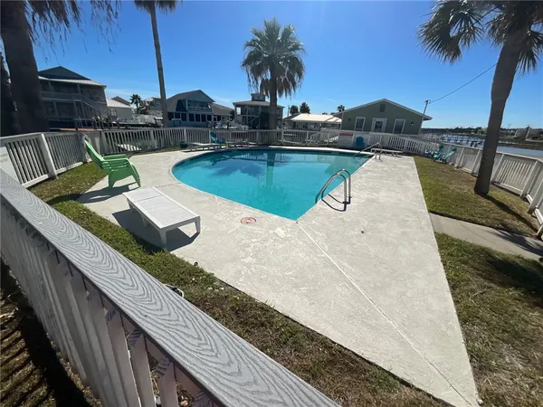 a view of outdoor space with swimming pool