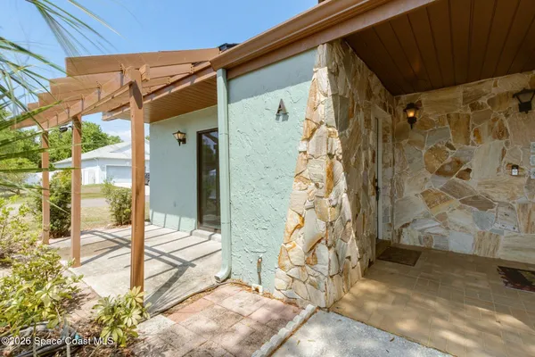 a view of a entryway door front of house