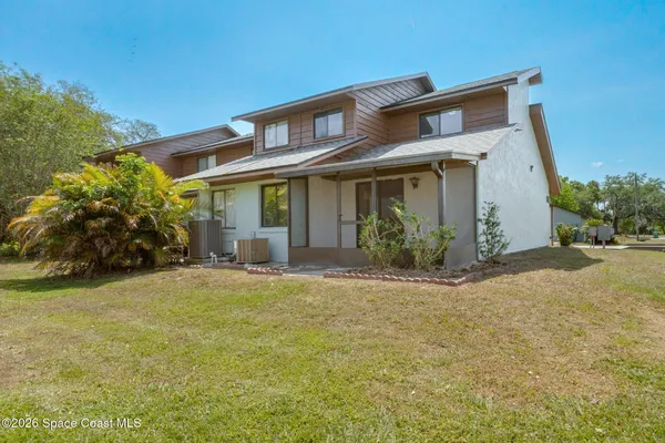 a front view of a house with a garage