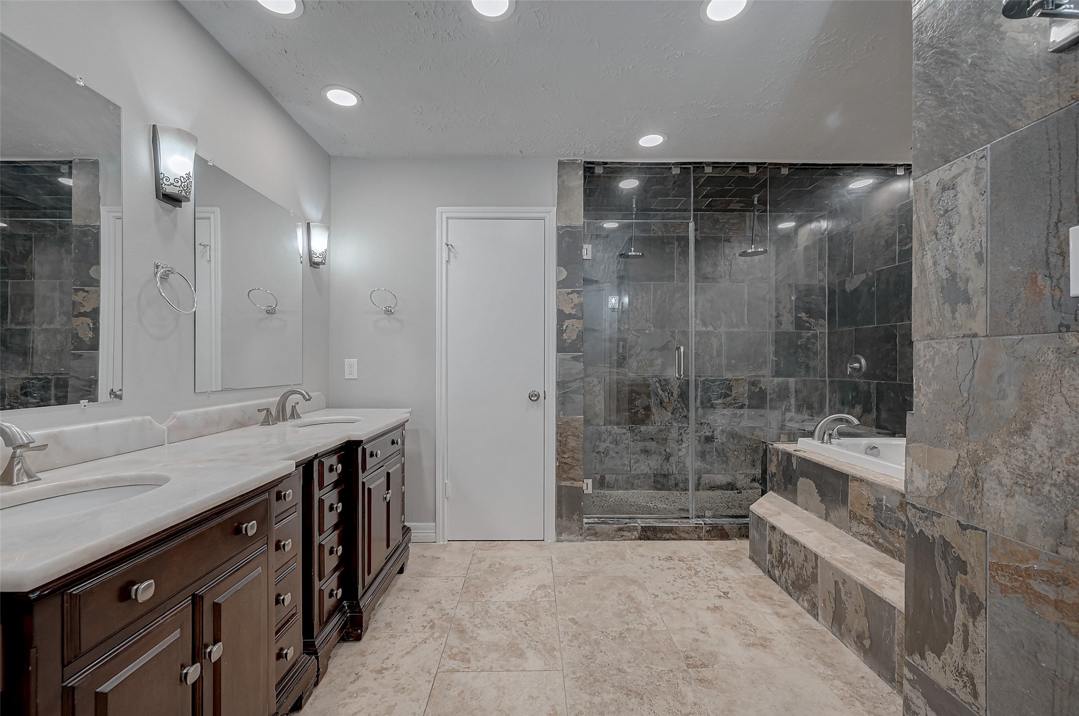 919 Mockingbird Way Sugar Land, TX 77478 - Photo 17 of 41 A dual-sink vanity with elegant fixtures, ample lighting.