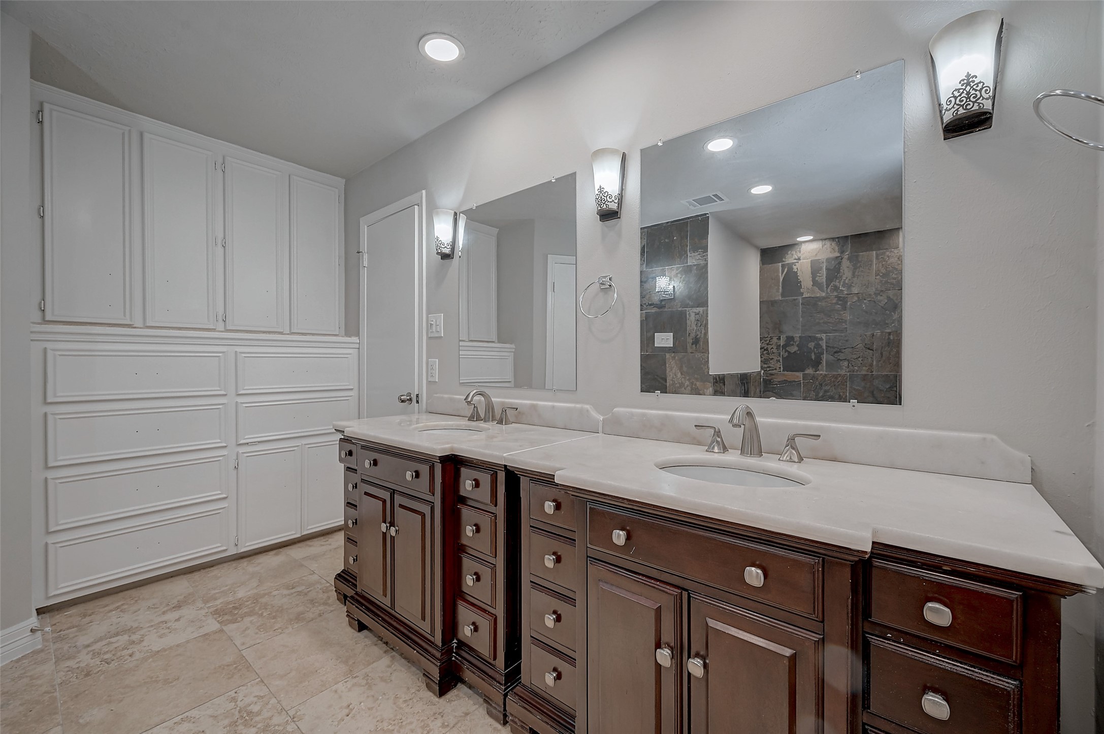 919 Mockingbird Way Sugar Land, TX 77478 - Photo 19 of 41 Bathroom featuring elegant double vanities, ample storage.