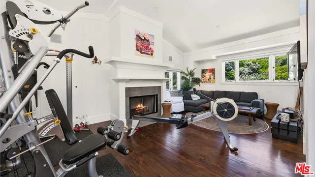 a view of a house with a small deck