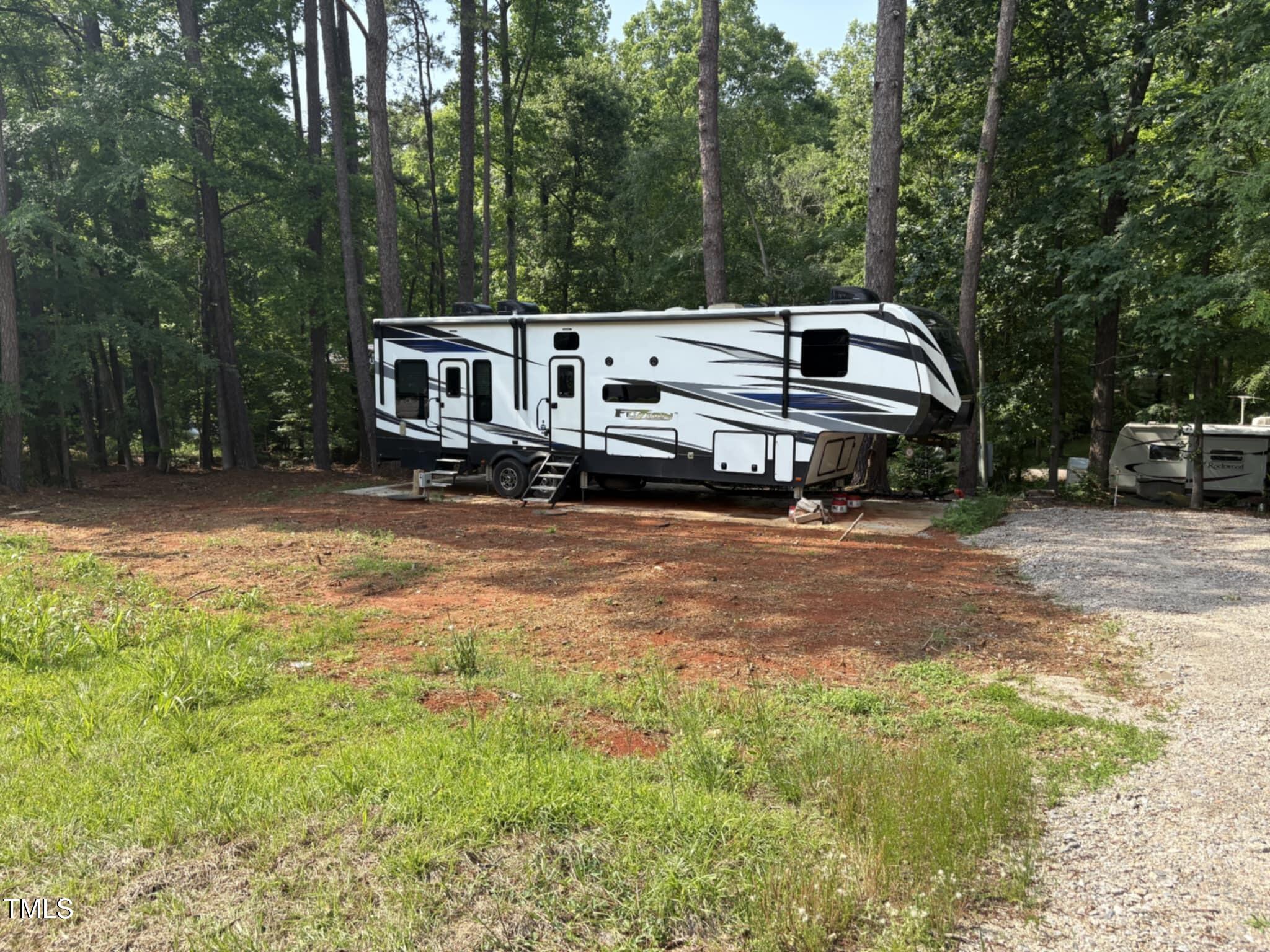 147 Osage Drive Spring Hope, NC 27882 - Photo 2 of 14 a view of a house with a yard