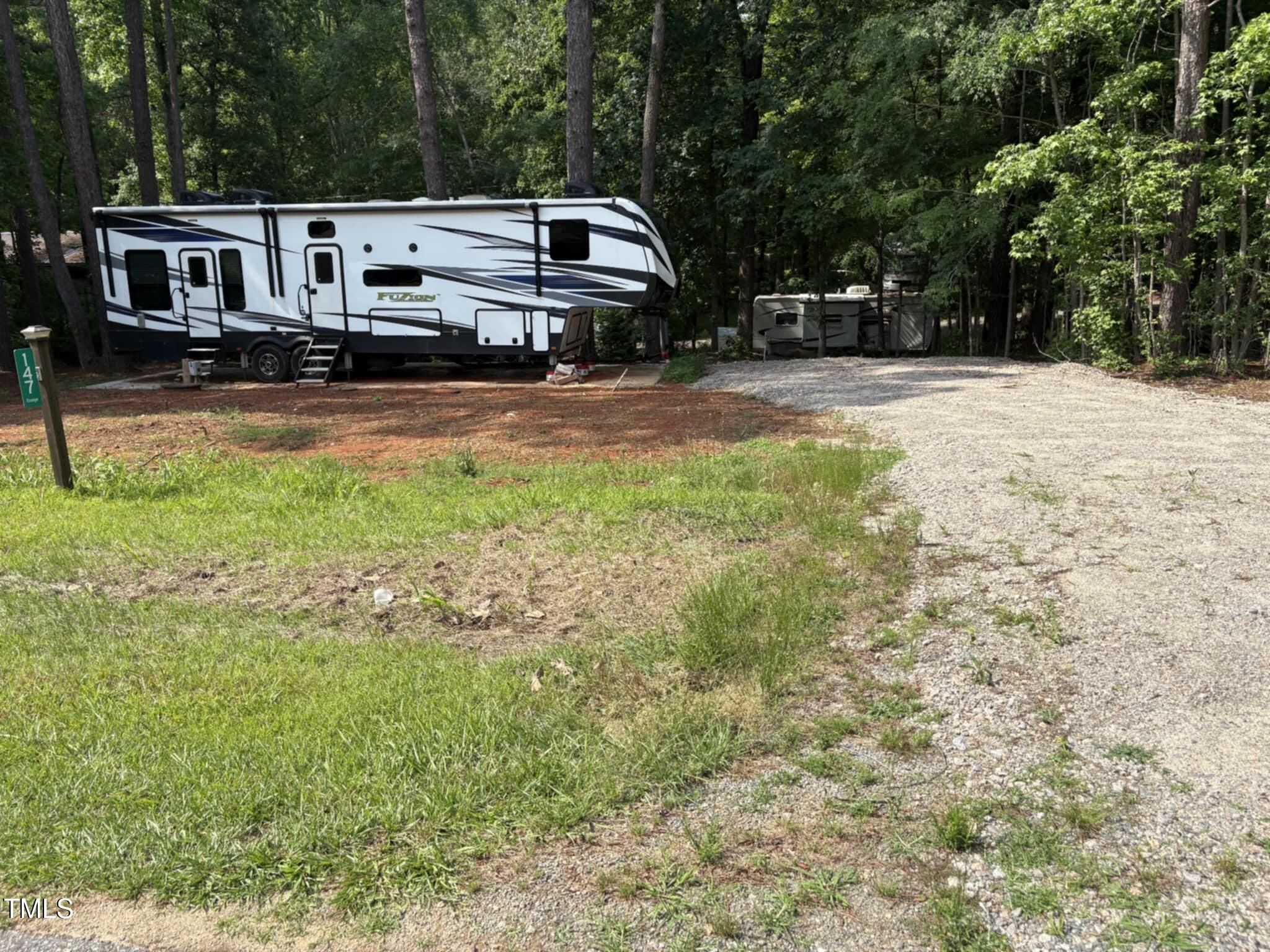 147 Osage Drive Spring Hope, NC 27882 - Photo 3 of 14 a view of a house with a yard