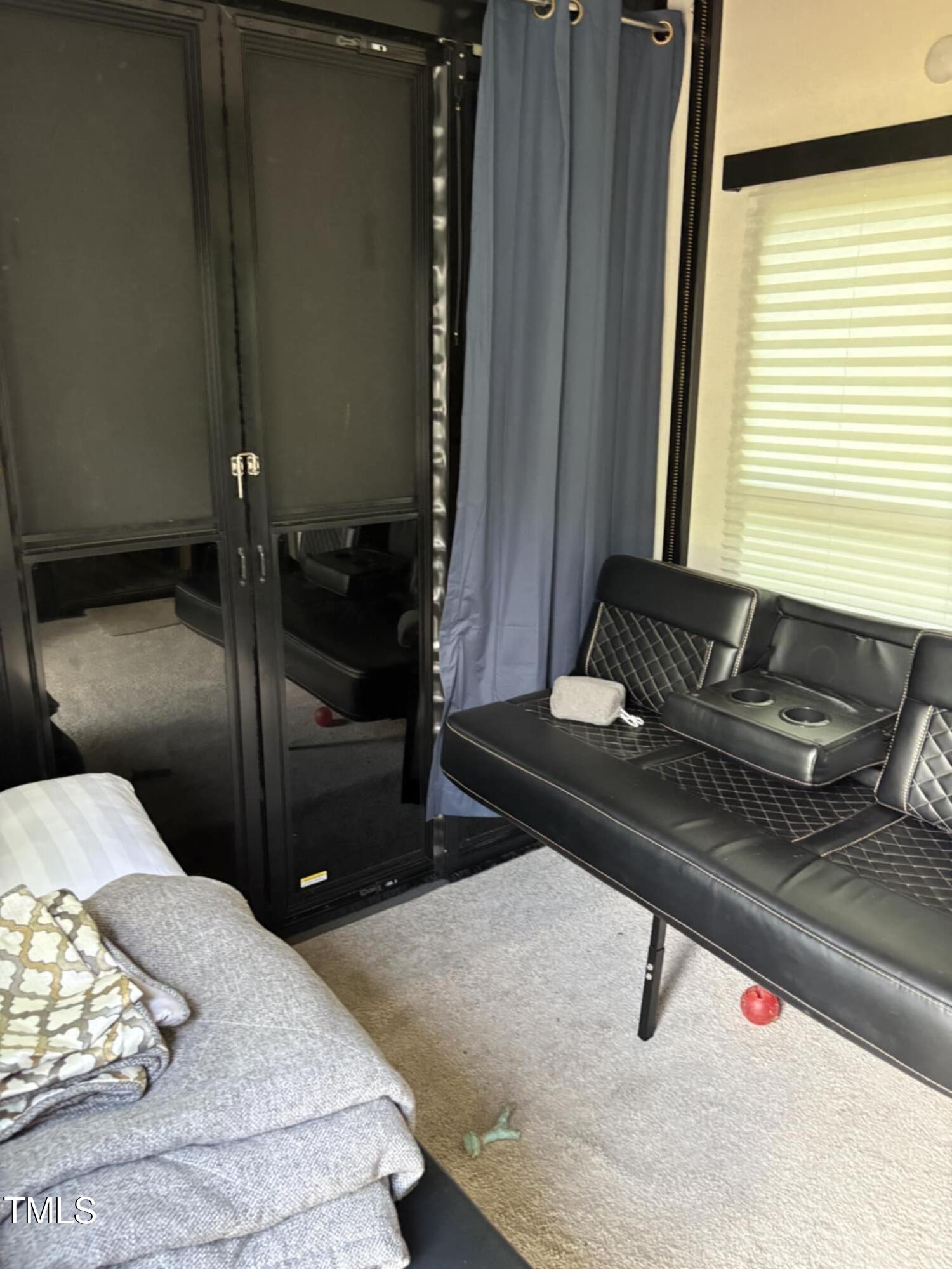 147 Osage Drive Spring Hope, NC 27882 - Photo 8 of 14 a bedroom with a bed and a dresser