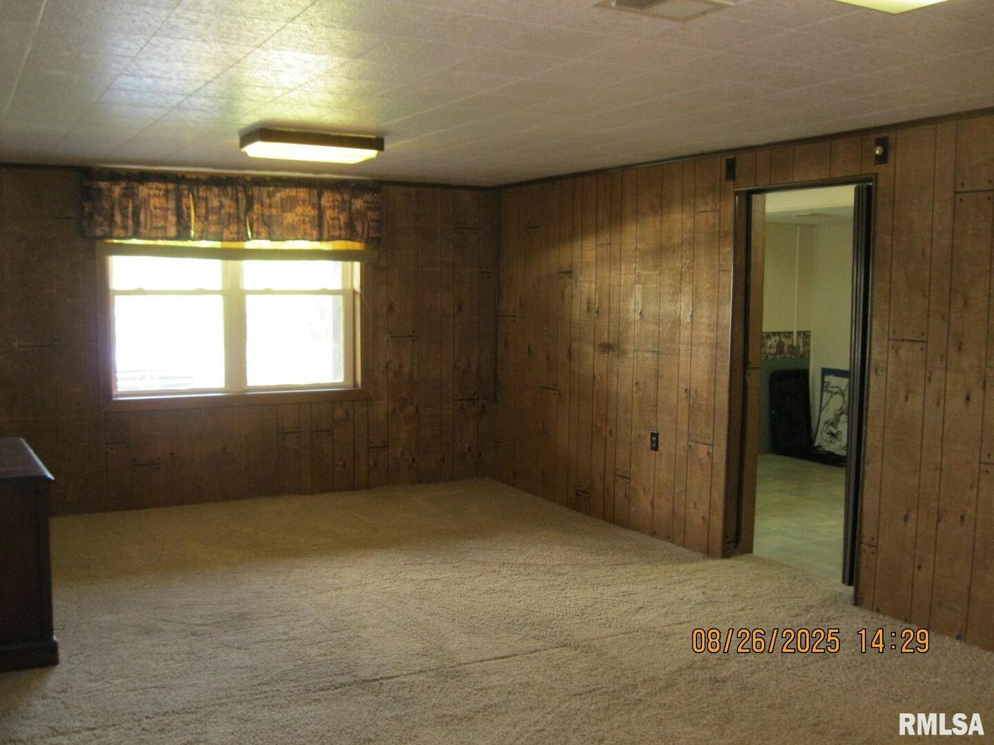 301 North Church Street Albany, IL 61230 - Photo 11 of 22 a view of an empty room with a window