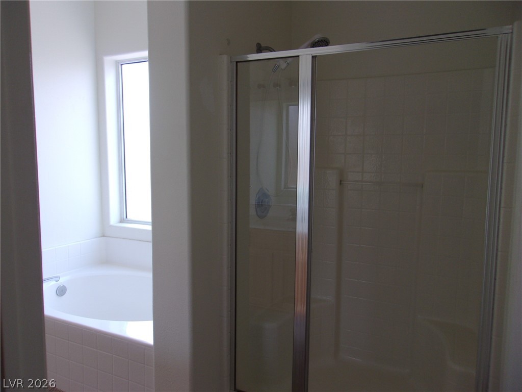 1160 Golf Club Drive Laughlin, NV 89029 - Photo 10 of 15 Bathroom with a bath and a shower stall