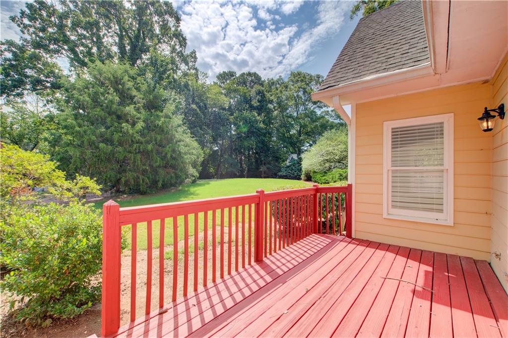 3 South Riversong Lane Alpharetta, GA 30022 - Photo 21 of 23 a view of balcony with wooden floor
