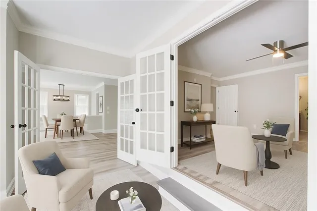 a living room with furniture and a table