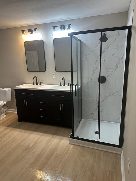 3 South Riversong Lane Alpharetta, GA 30022 - Photo 10 of 23 a bathroom with a double vanity sink mirror and tub