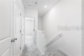 2995 Skyline Loop Kissimmee, FL 34758 - Photo 19 of 46 a view of a hallway with closet