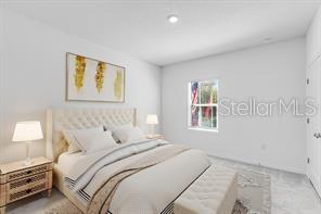 2995 Skyline Loop Kissimmee, FL 34758 - Photo 21 of 46 a bedroom with a bed and a window