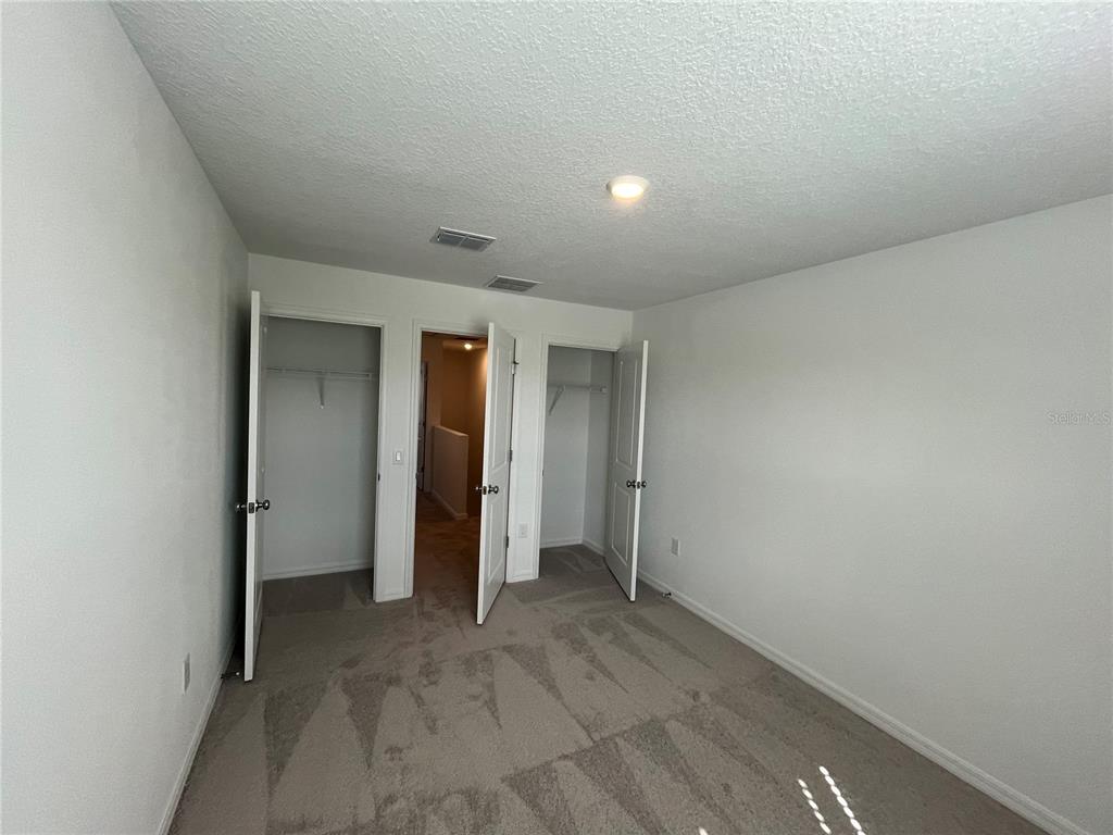 2995 Skyline Loop Kissimmee, FL 34758 - Photo 30 of 46 a view of an empty room