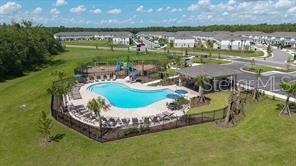 2995 Skyline Loop Kissimmee, FL 34758 - Photo 38 of 46 a view of a lake with a big yard