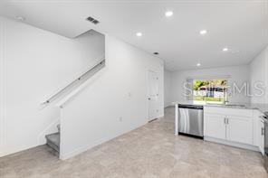 2995 Skyline Loop Kissimmee, FL 34758 - Photo 5 of 46 a view of a kitchen with a sink