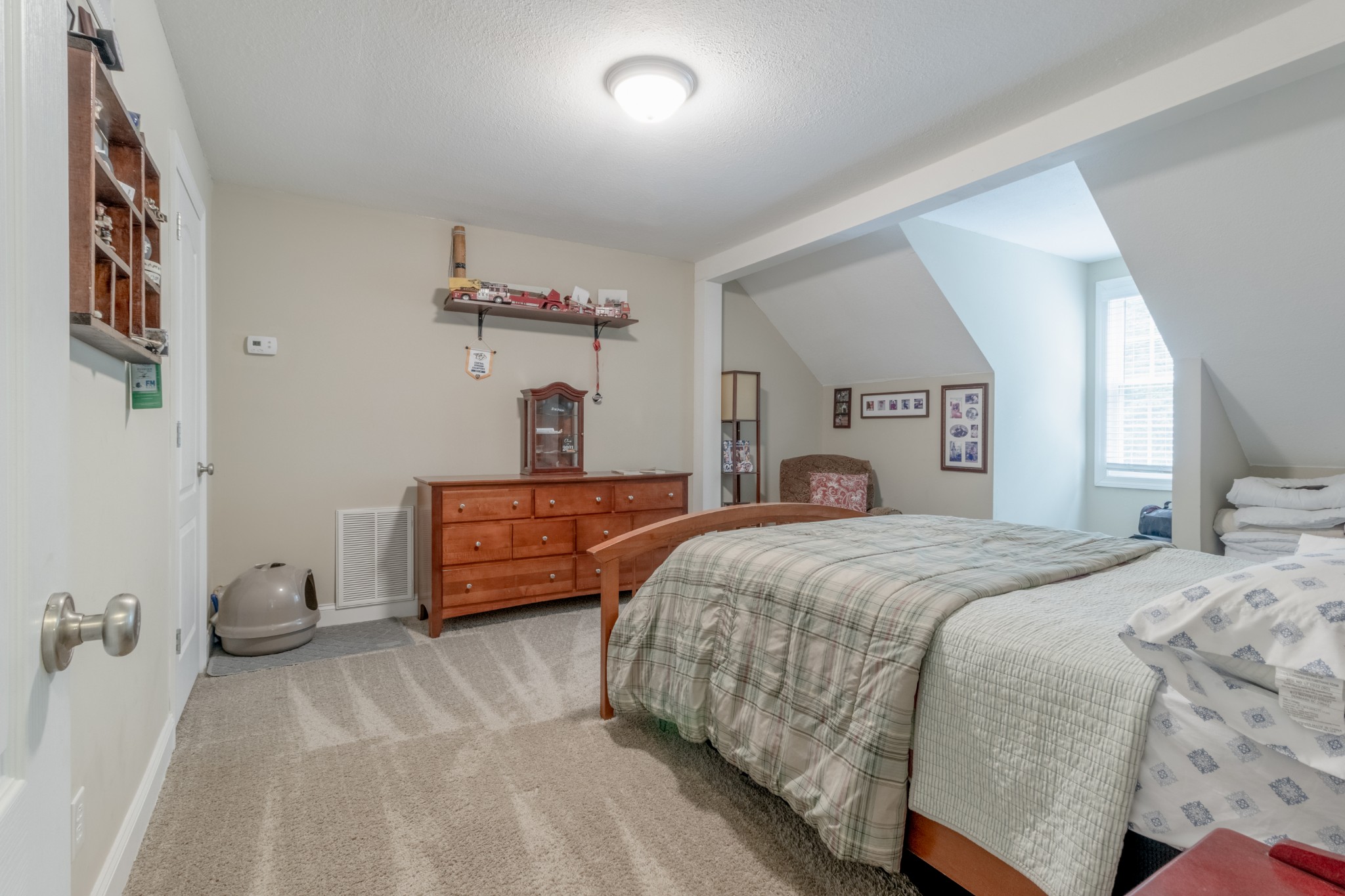 491 Harper Road Clarksville, TN 37043 - Photo 23 of 33 a bedroom with a bed and closet